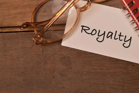 Top view of memo note written with text ROYALTY Stock Photos
