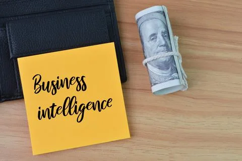 Top view of memo note written with text BUSINESS INTELLIGENCE. Stock Photos
