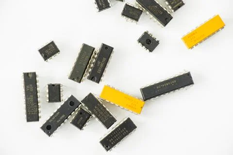 Top view of microprocessor and microchips on white background with copy space Stock Photos