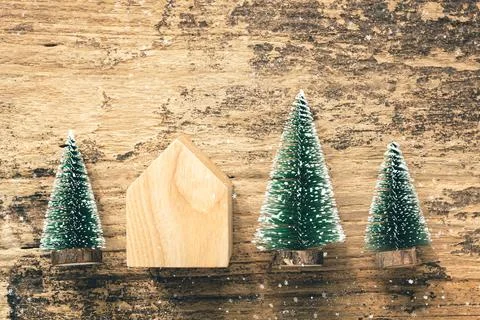 Top view of mini christmas tree wood home toy on rustic wooden table with s.. Stock Photos