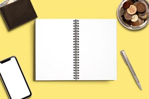 Top view Minimal design of open Notebook with pen wallet and coins jar Stock Photos