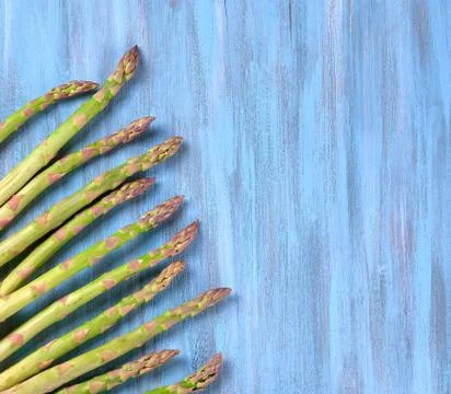 Top view on minimal layout with raw asparagus Stock Photos