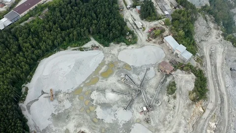 Top view of mining installation working on granitte quarry. 스톡 동영상 113531911