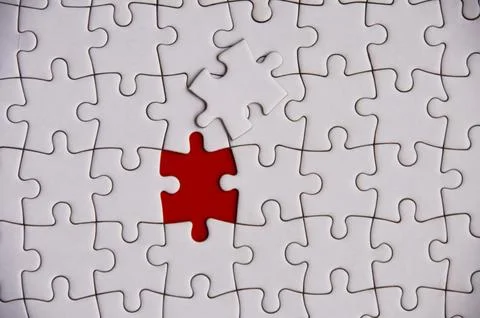 Top view of missing jigsaw puzzle. Conceptual Stock Photos