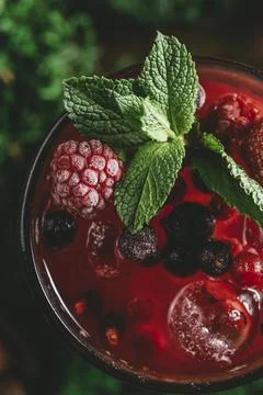 Top view of mixed drink with raspberry, cranberry and strawberry Stock Photos
