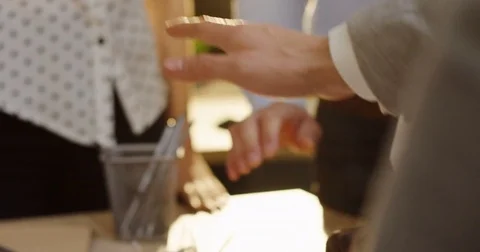Top view of mixed races hands putting on each others as a team on the white Stock Footage 82446625
