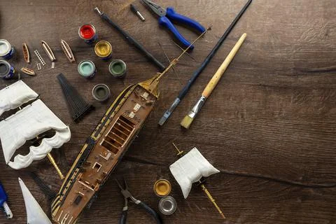 Top view Model Ship Building handcraft on table with different materials Stock Photos