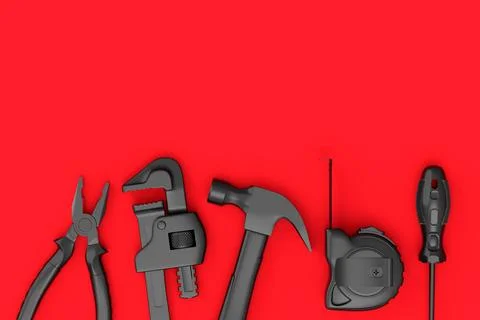 Top view of monochrome construction tools for repair on red background Stock Photos