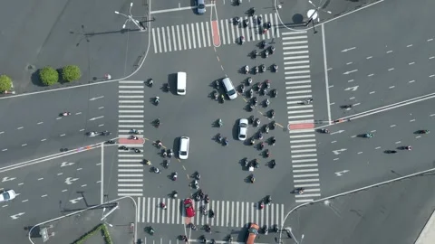 Top view of morning traffic at intersection in Ho Chi Minh City, Vietnam Stock Footage 255273725