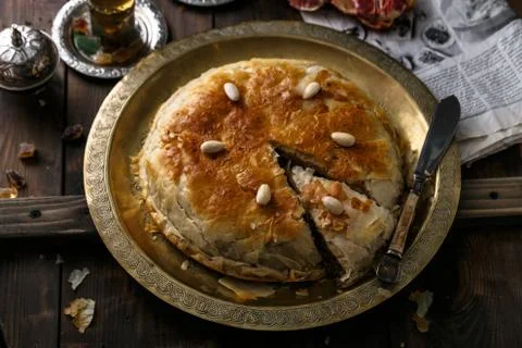Top view of morrocan pie on copper plate Stock Photos