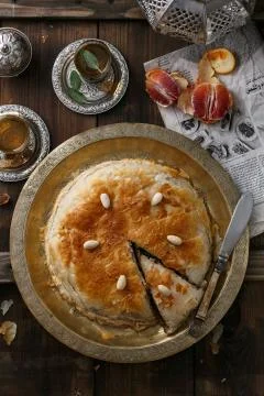 Top view of morrocan pie on copper plate Stock Photos