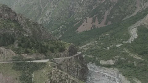 Top view of the mountain asphalt road. tourists and driving cars. Stock Footage 237768295