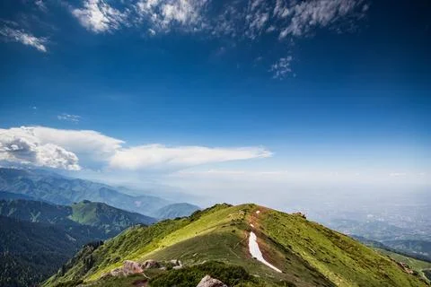 Top view of the mountain peak three brothers in the Almaty mountains with Stock Photos