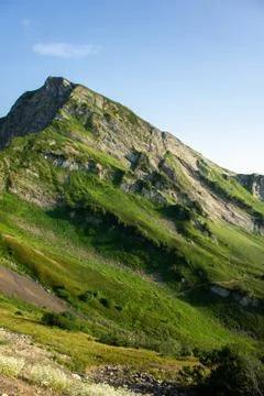 Top view of the mountain range and peaks. Mountain peak in the summer. Stock Photos