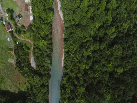 Top view of the mountain river near the village Stock-Footage 80249114