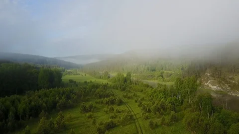 Top view of a mountain river through clouds Stock Footage 116534848
