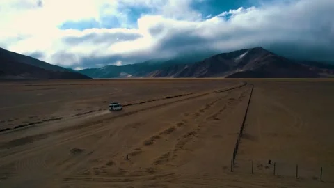 Top view of mountain road with moving car. Stock Footage 265976859