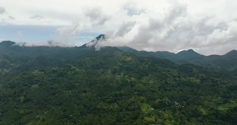 Top view of Mountain slopes covered with rainforest. Stock Footage 233479296