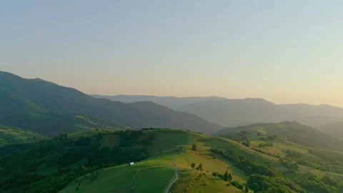 Top view to mountain train on green hill Stock Footage 321768895