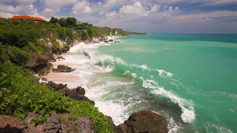 Top view from mountain to tropical beach with huge waves for surfers Stock Footage 73119008