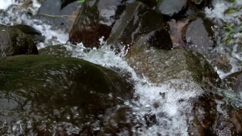 Top view of a mountain waterfall that flows fast and clear Stock Footage 297887729