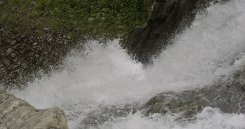 Top view of a mountain waterfall splash Stock Footage 256992025