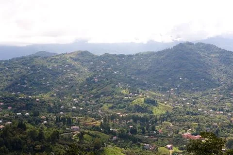 Top view of the mountains and the settlements located on them with houses. Stock Photos