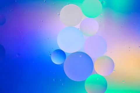 Top view movement of bubbles in the liquid. Oil surface multicolored backgr.. Stock Illustration