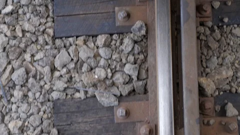 Top view moving forward in slow motion over train tracks Stock Footage 102331879