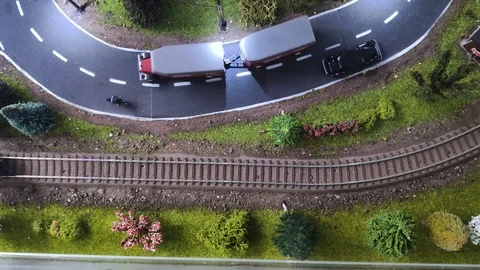 Top view of a moving model of a steam locomotive. Detailed model of peron and tr Stock-Footage 119660596