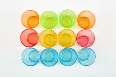 Top view on multi-colored glasses of glass. Caring for the environment. Stock Photos