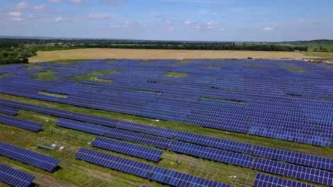 Top view of a new solar farm. Rows of modern photovoltaic solar panels Stock Footage 192963264