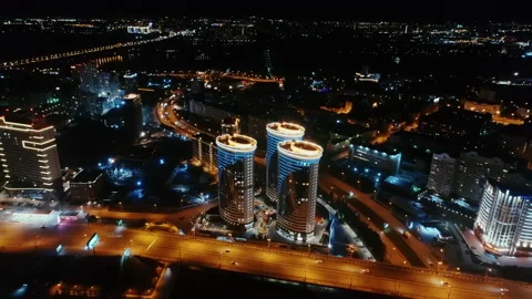 Top view of the night city. Beautiful modern buildings at night. LED lighting of Stock Footage 148488672
