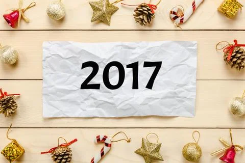Top view note text 2017 with crumpled paper Chrismas decoration and ornament Stock Photos