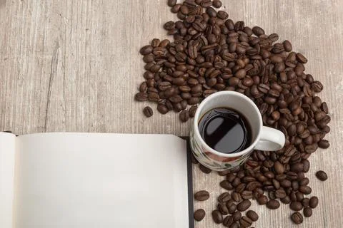 Top view of notebook and coffee cup Stock Photos