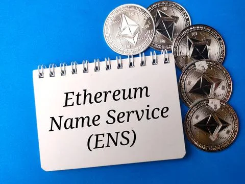 Top view notebook and eth coins with text Ethereum name service Stock Photos