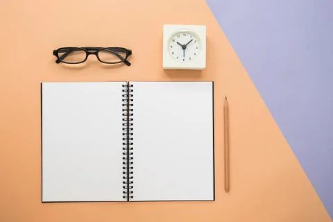 Top view of notebook and pencil Stock Photos