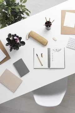 Top view notebook with to do list on desk Stock Photos