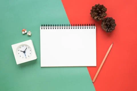 Top view of notebook on red green Christmas Stock Photos