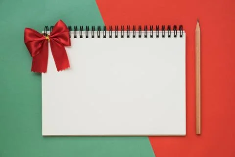Top view of notebook on red green Christmas Stock Photos