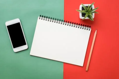 Top view of notebook on red green Christmas Stock Photos