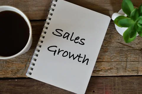 Top view of notebook written with text SALES GROWTH. Stock Photos