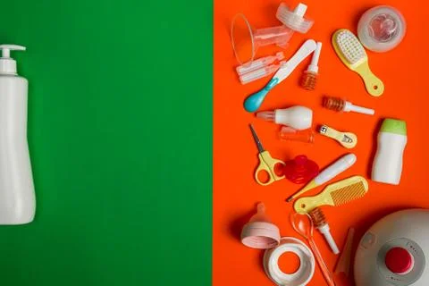 Top view of nursing essentials with red pacifier Stock Photos