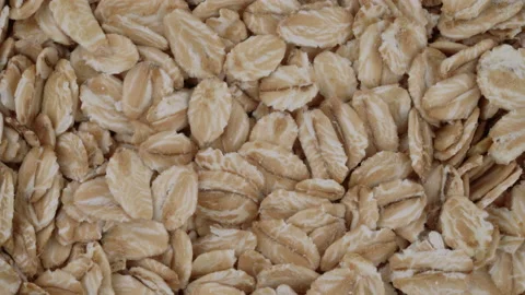 Top view of oat flakes rotating. Closeup. Macro. Stock Footage 170656944