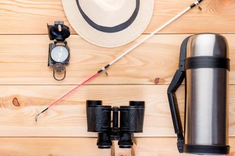 Top view objects to search for fish and fishing on the wooden floor Foto stock