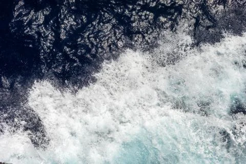 Top view of the ocean with large waves from the ship. sea background. Stock Photos