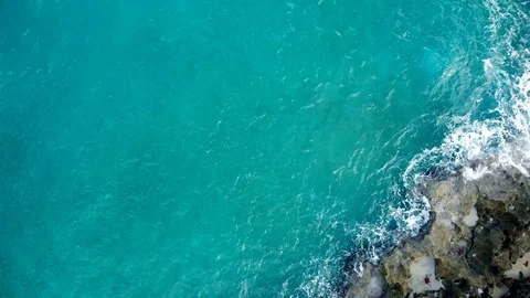 Top view as ocean waves break on the rif Stock Footage 101484534