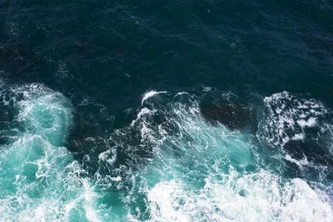 Top view on ocean waves. Stock Photos