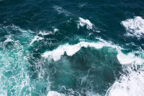 Top view on ocean waves. Stock Photos