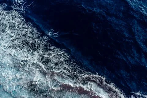 Top view of ocean waves. Stock Photos
